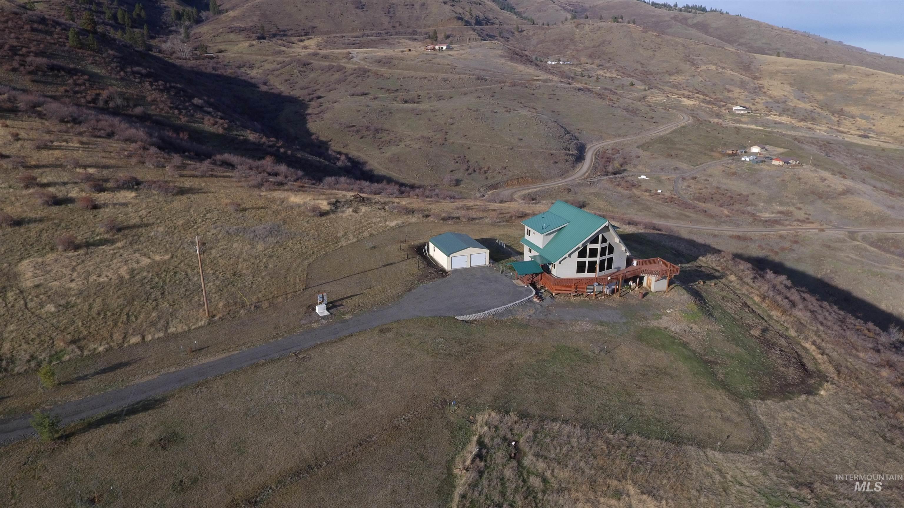Aerial view of property's location featuring rural landscape