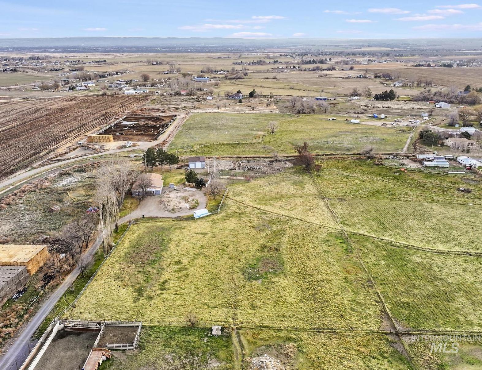 Aerial view of property's location with rural landscape
