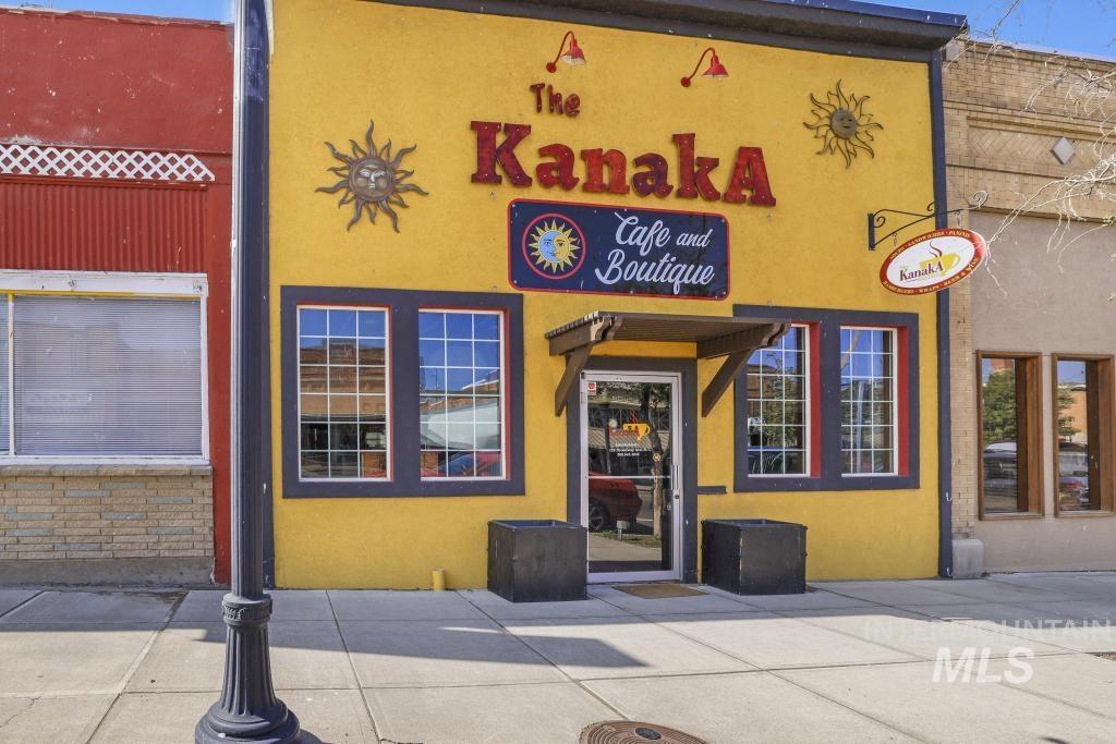 Entrance to property with stucco siding