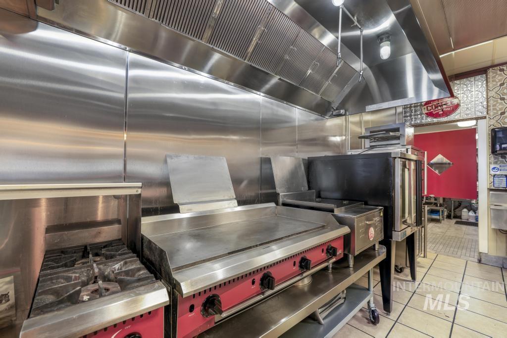 Kitchen featuring light tile patterned floors
