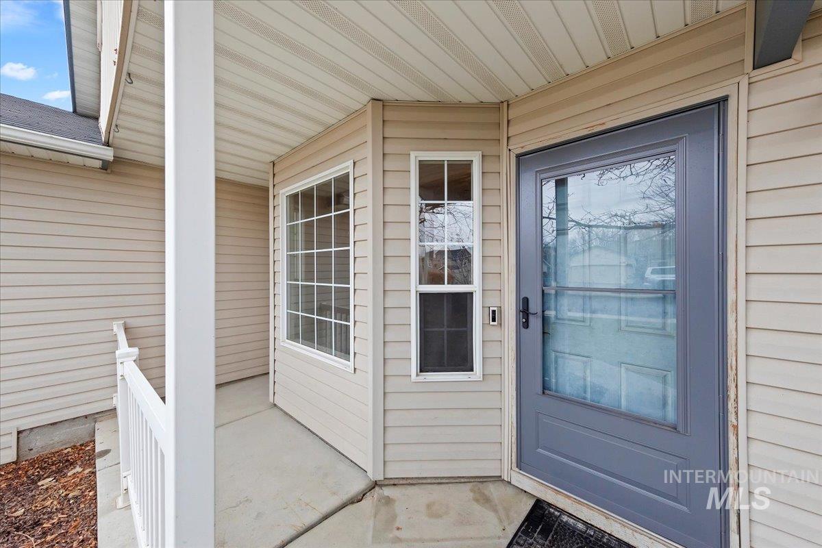 Property entrance with a porch