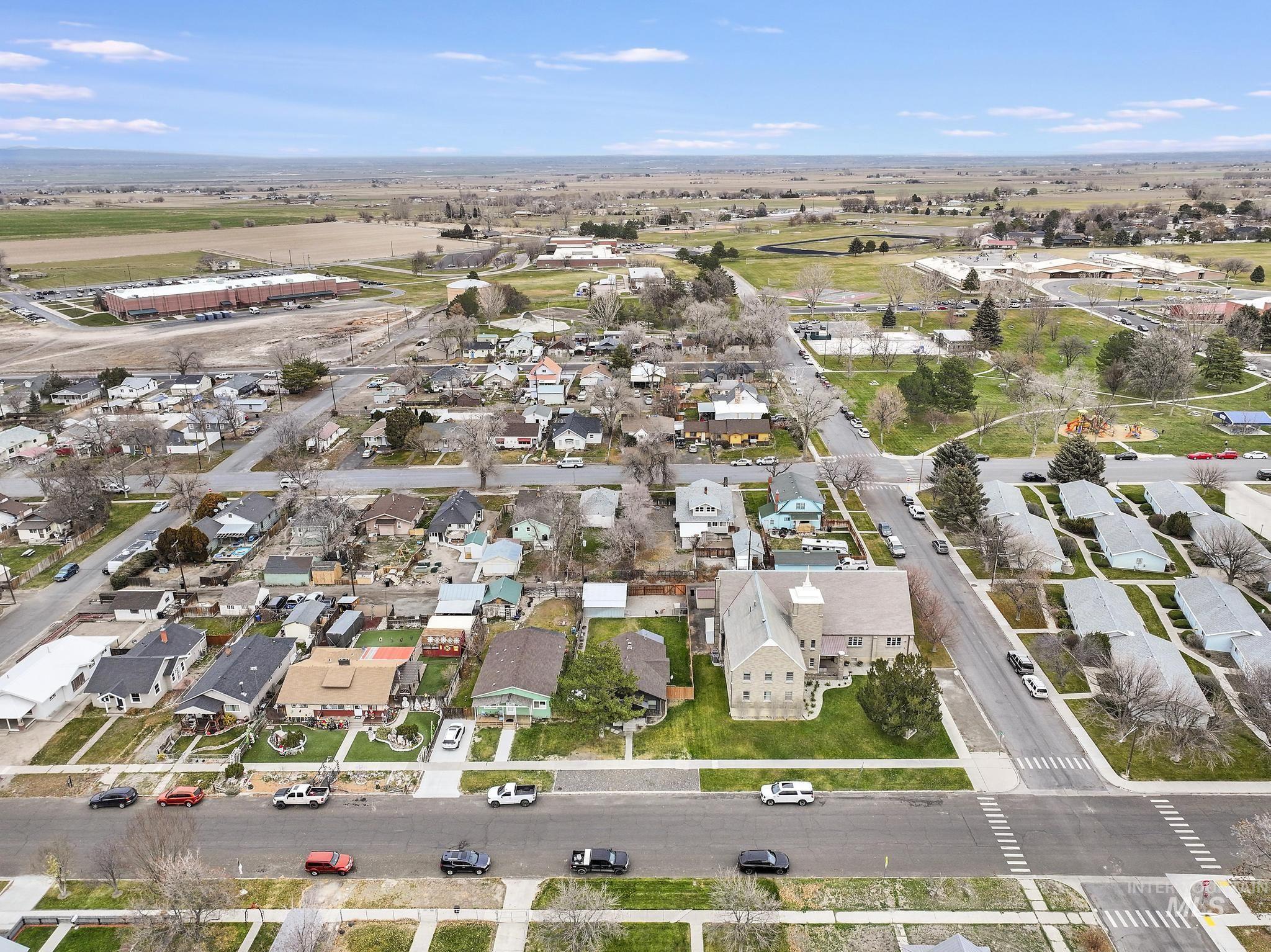 View of property location with nearby suburban area