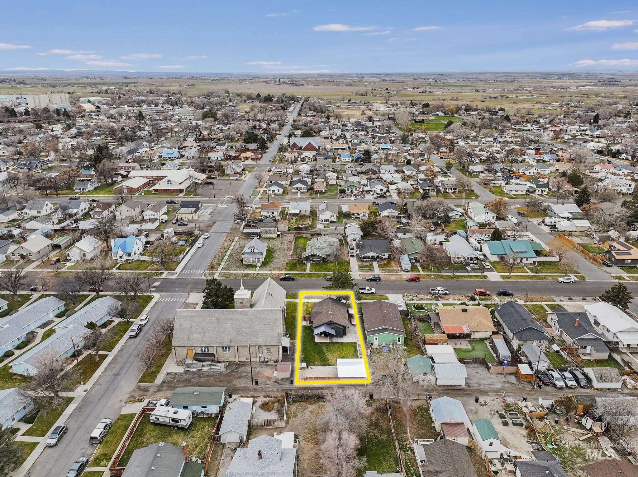 View of property location featuring nearby suburban area and property parcel outlined