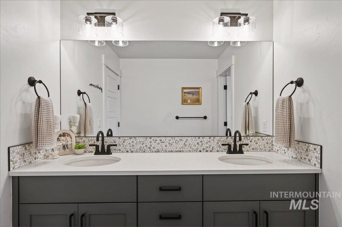 Full bathroom with double vanity