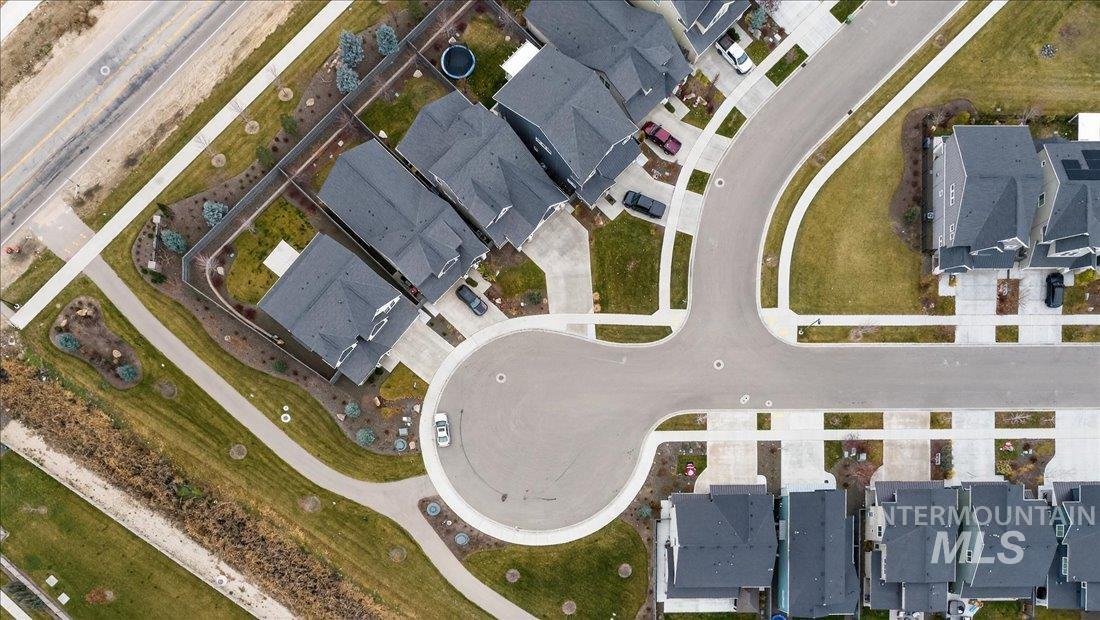 View of property location with nearby suburban area