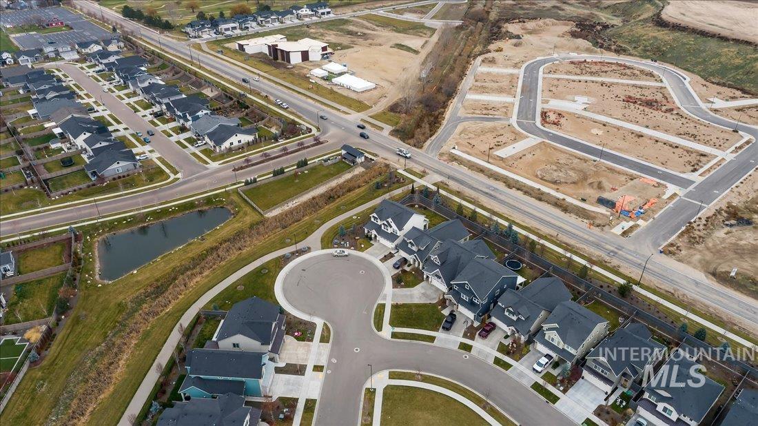 View of property location with nearby suburban area and a large body of water