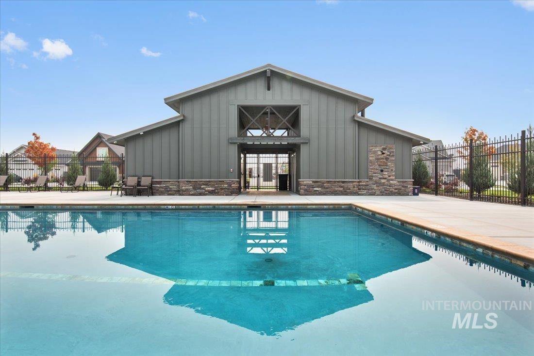 Community pool featuring a patio area