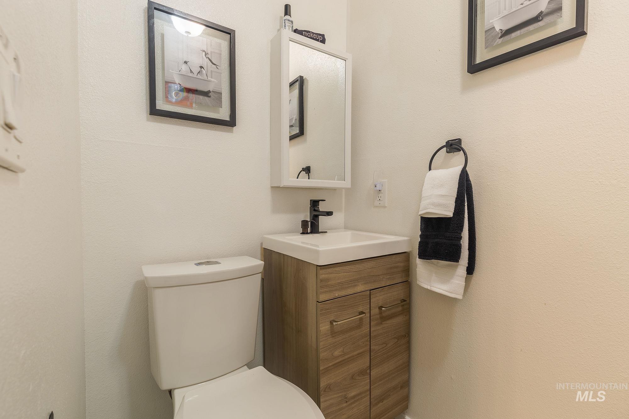 Bathroom with vanity and toilet