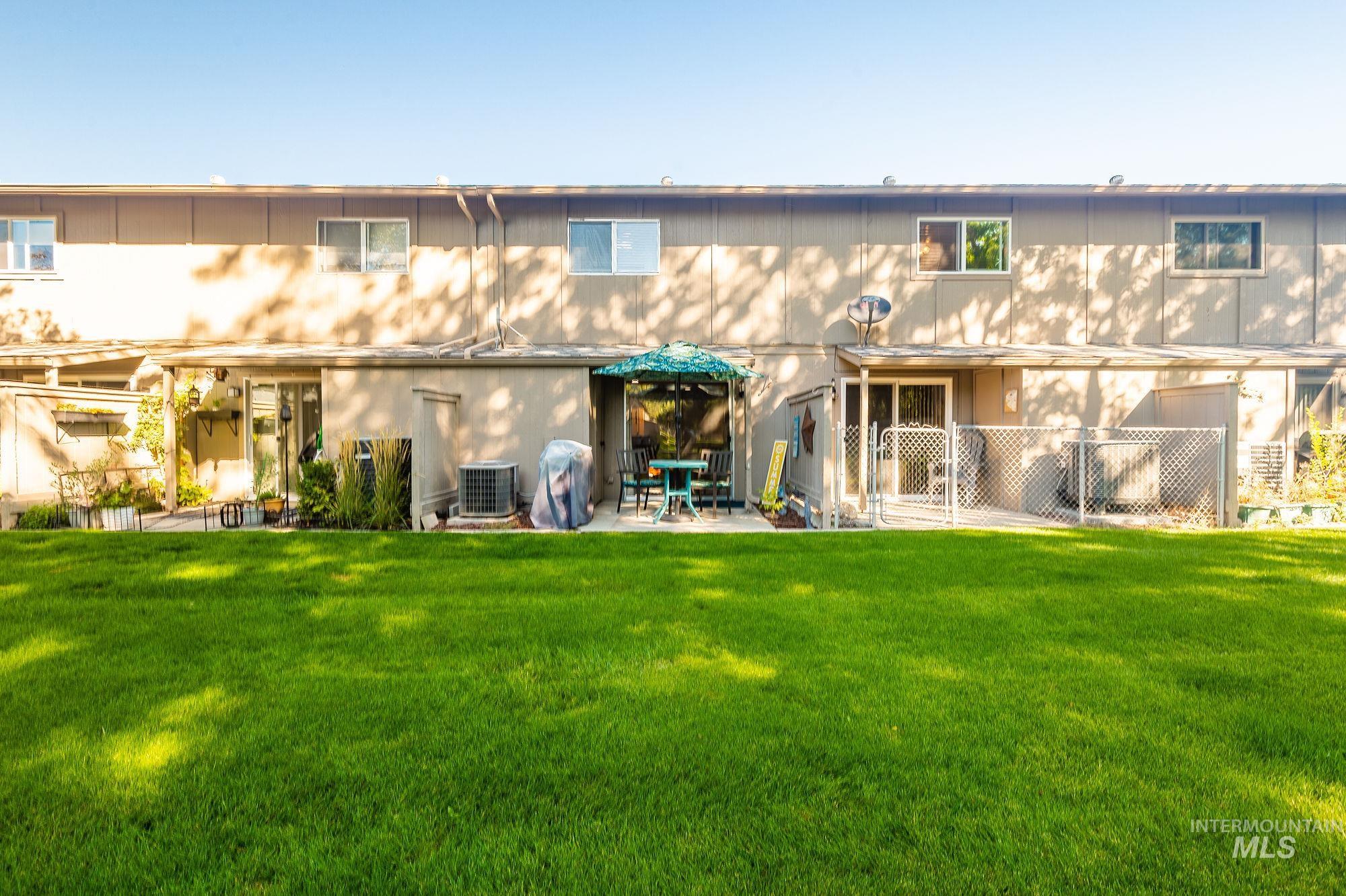 Rear view of house with a patio