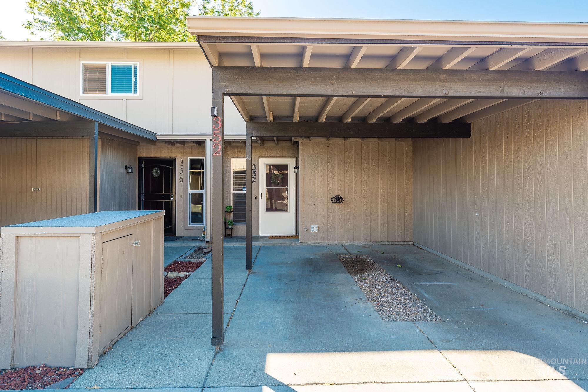 View of patio featuring a carport