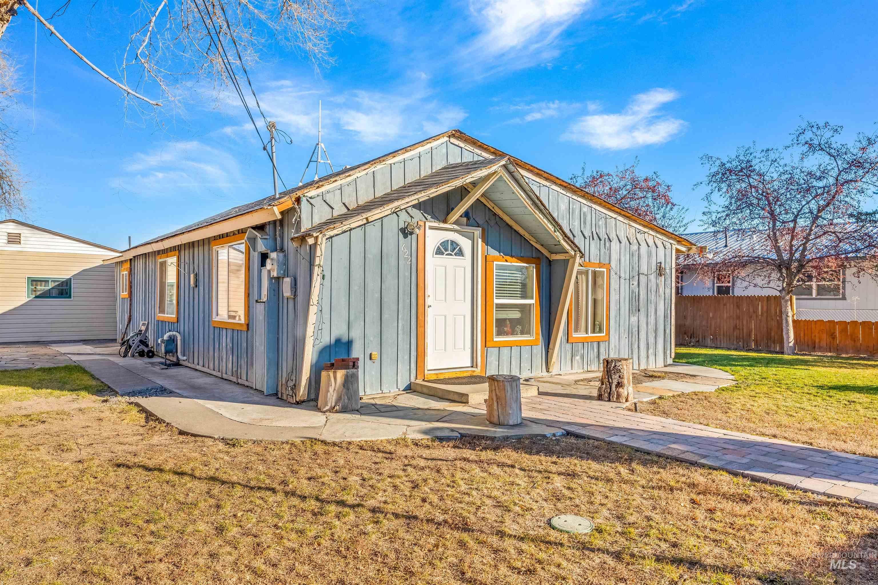 View of front of property featuring board and batten siding