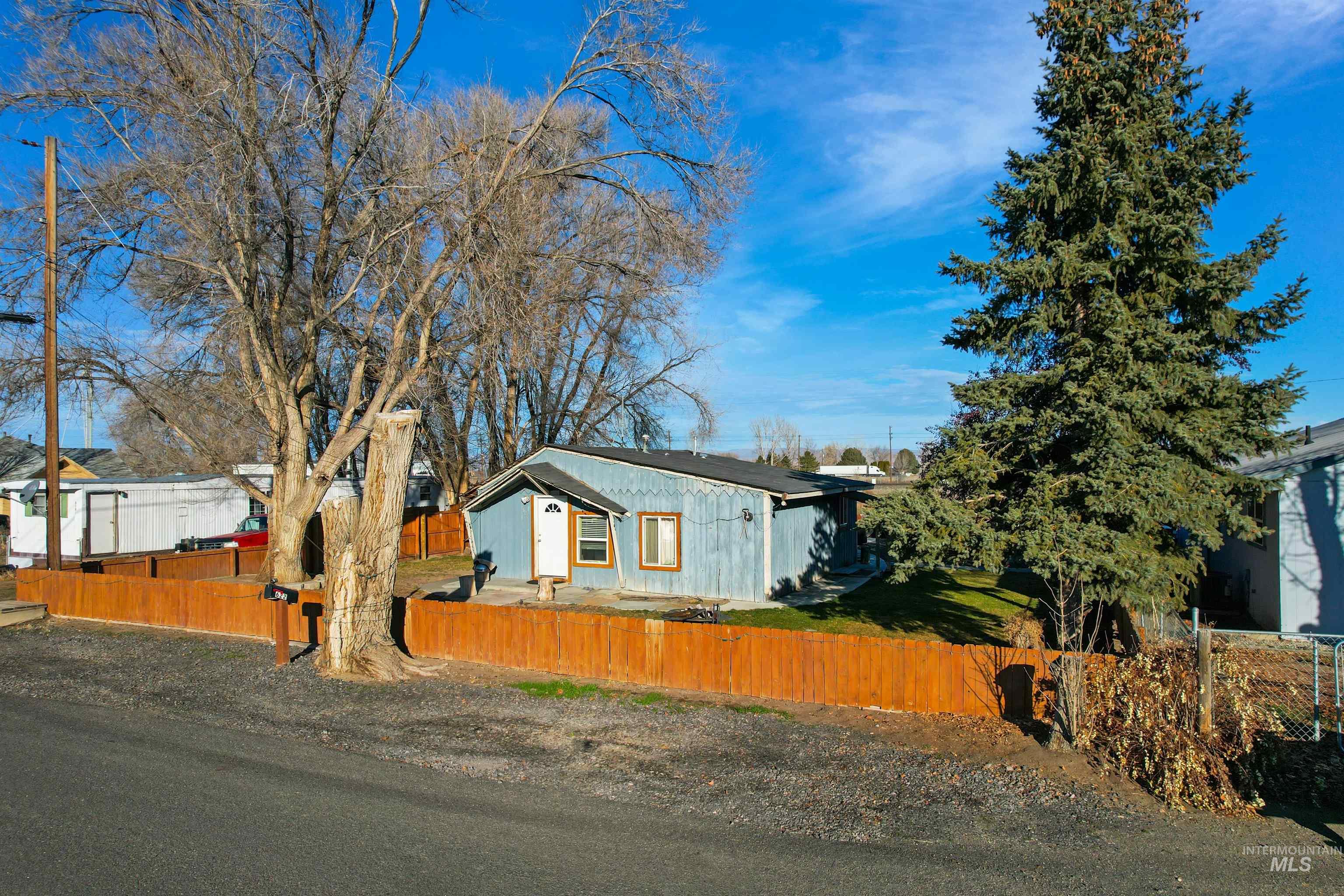 View of front of property with a fenced front yard