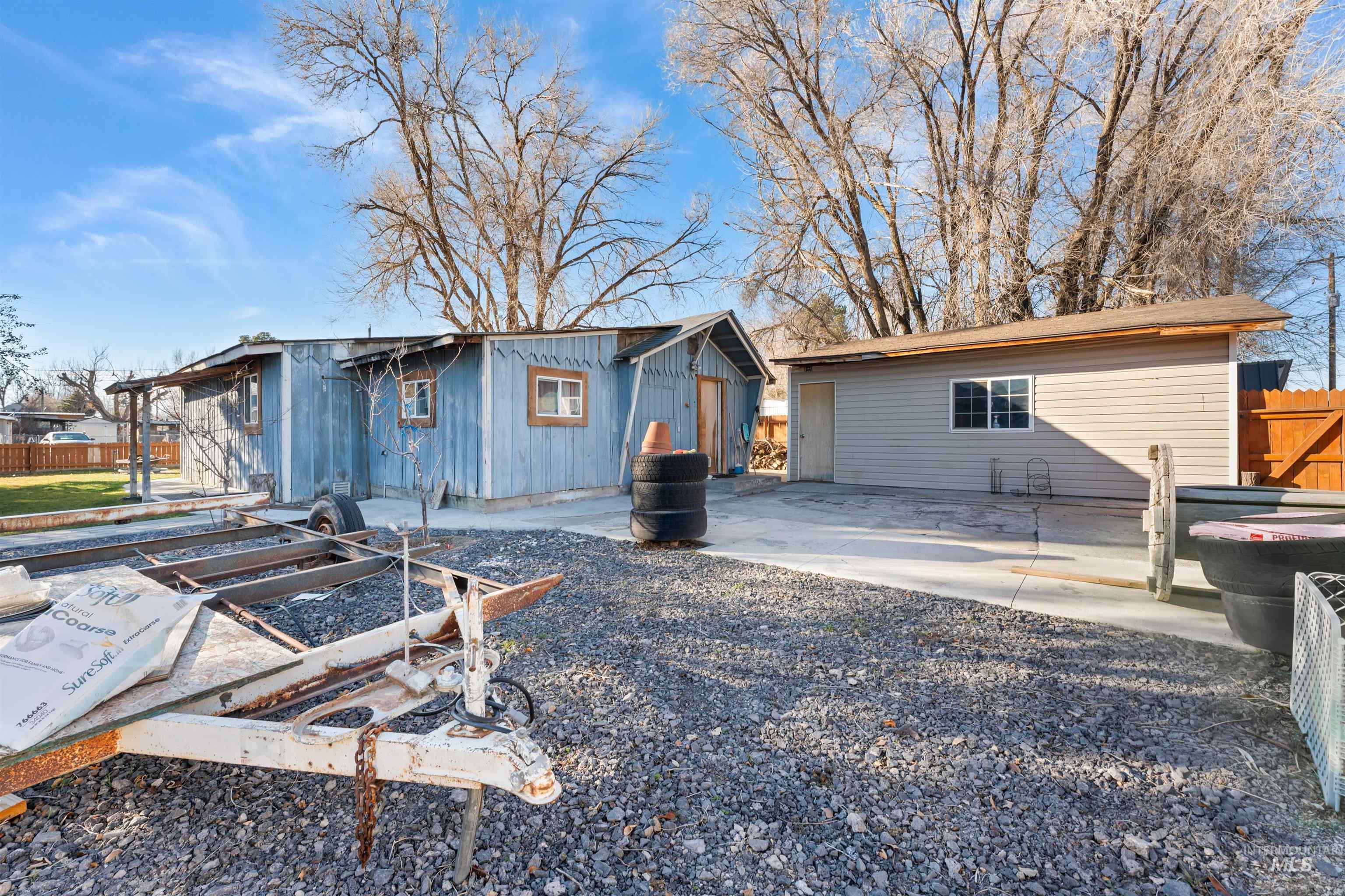 Rear view of property featuring a patio