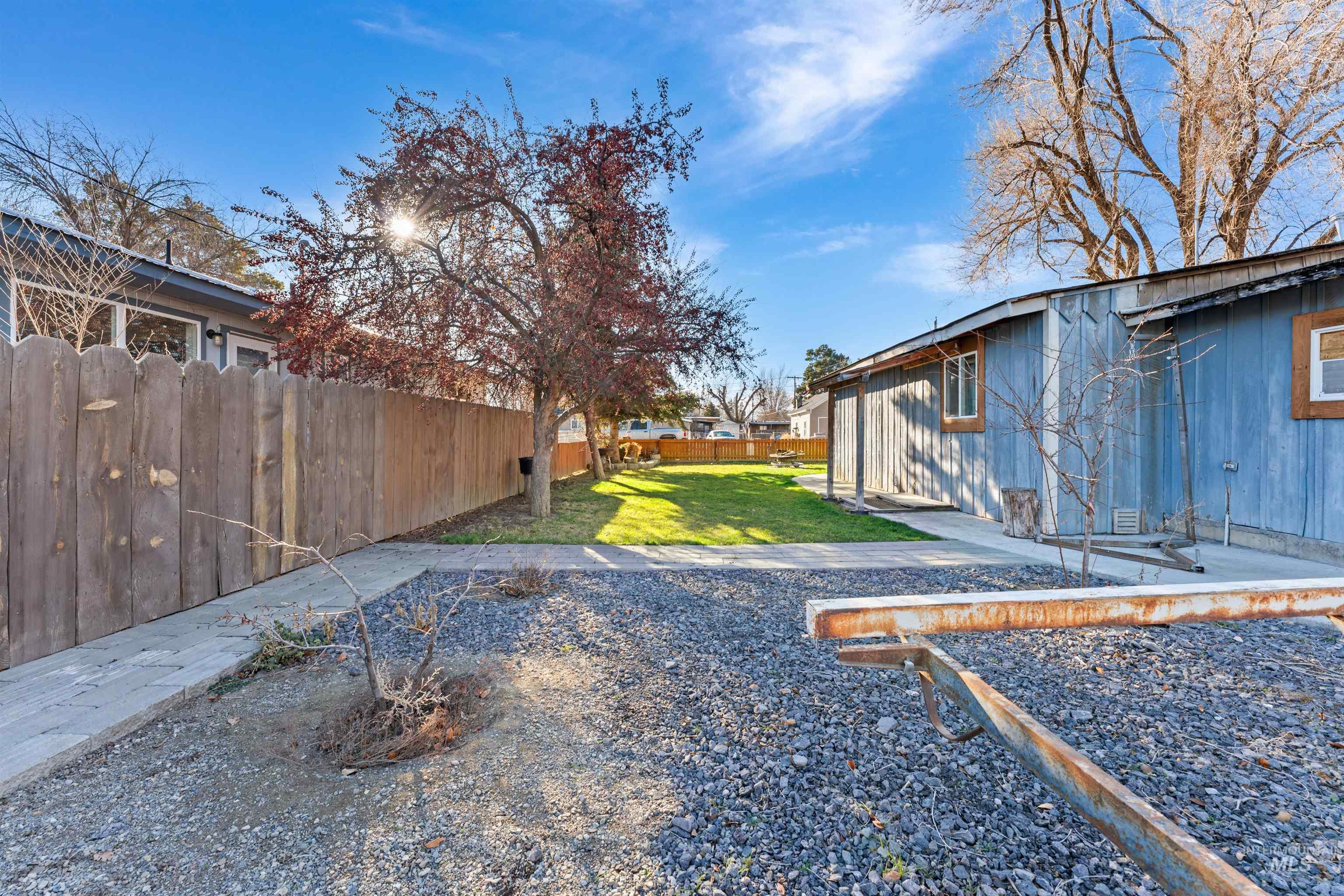 View of fenced backyard