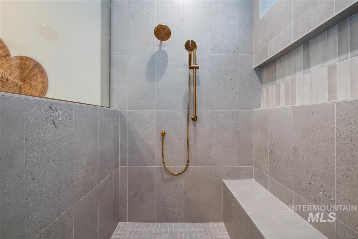 Bathroom featuring tiled shower