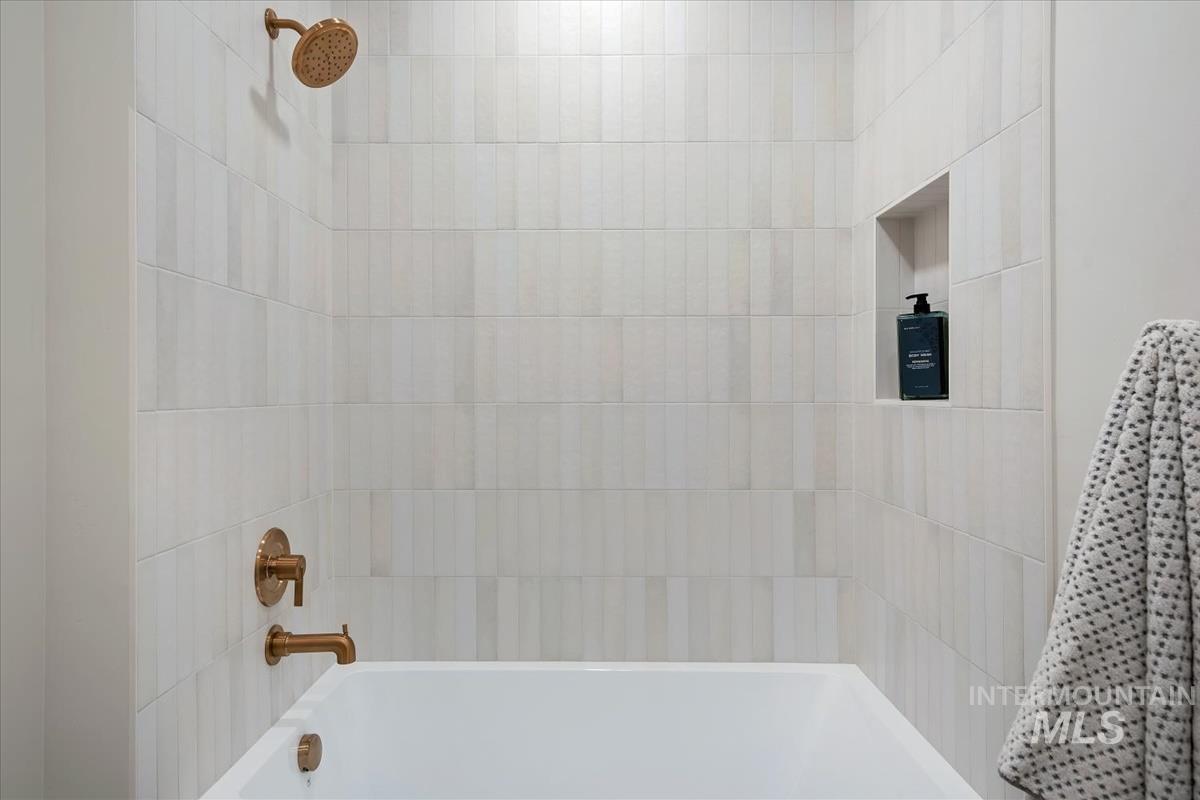 Full bathroom featuring shower / bath combination