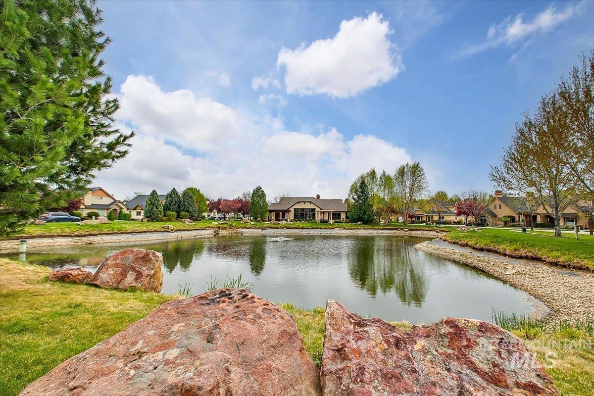 Water view with nearby suburban area