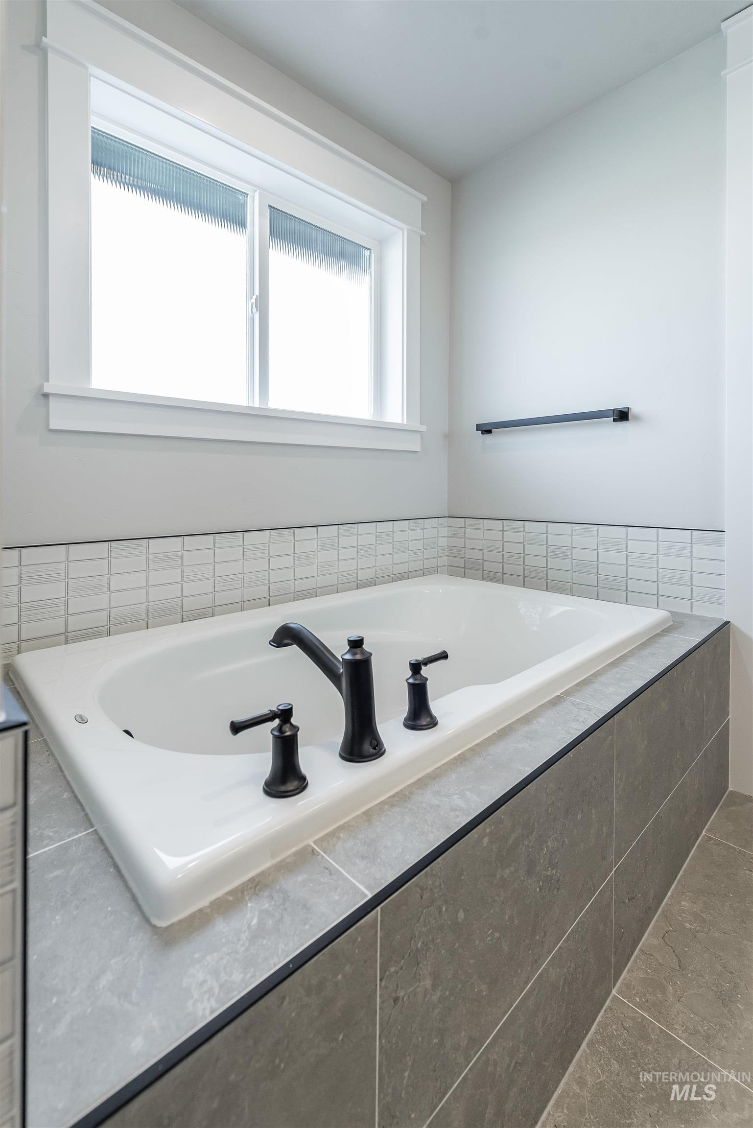 Full bath with a bath