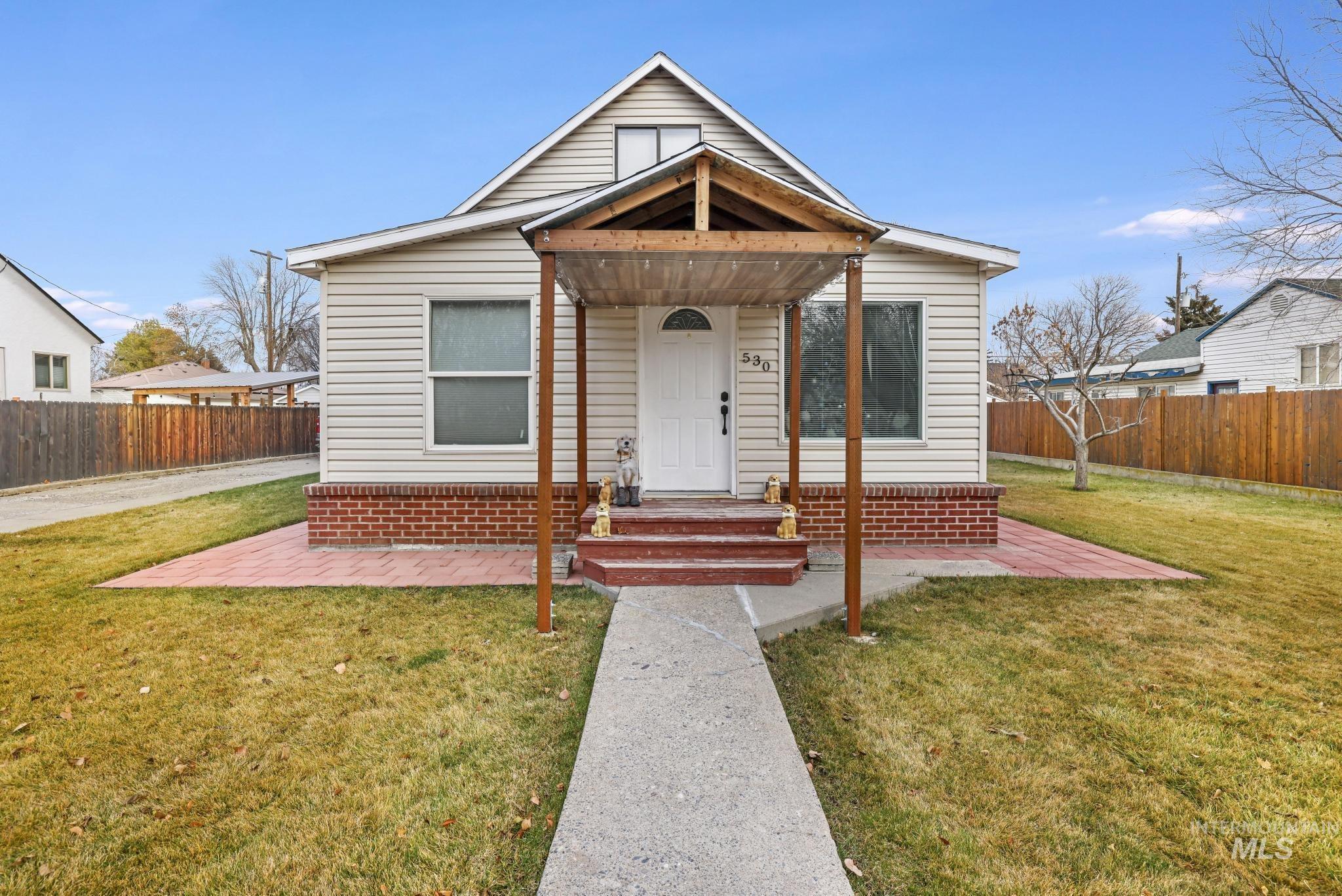 View of front of house featuring a patio
