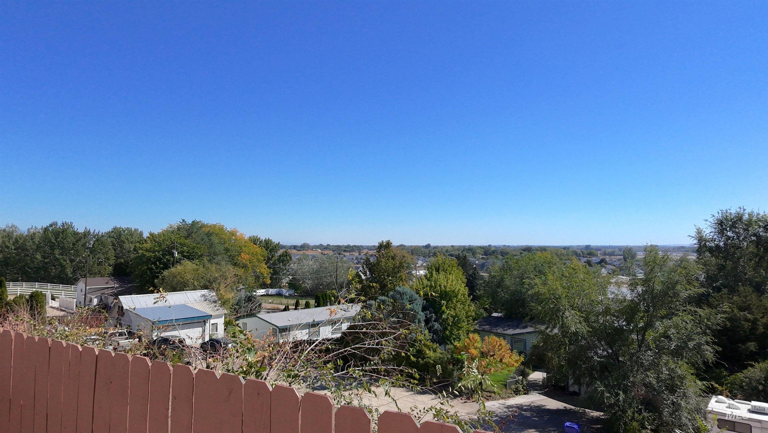 Drone / aerial view of a tree filled landscape
