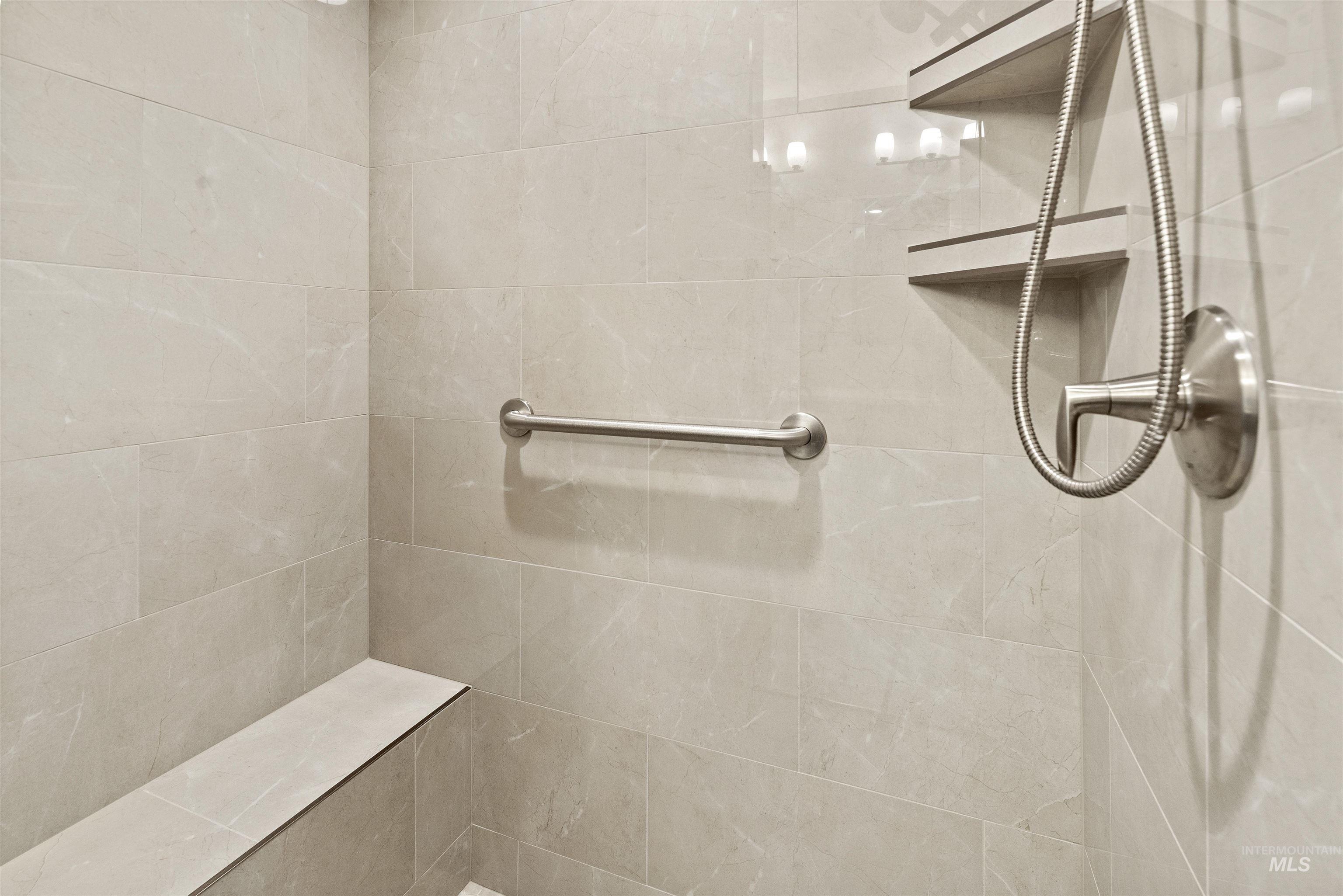 Bathroom featuring tiled shower