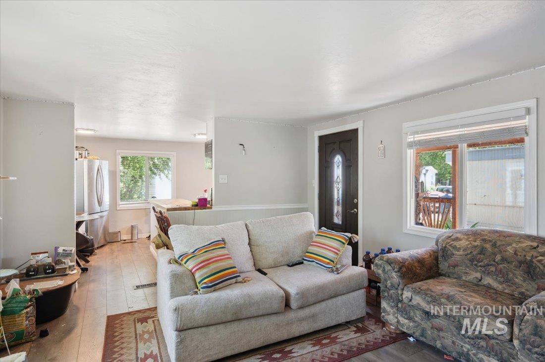 Living area featuring wood-type flooring