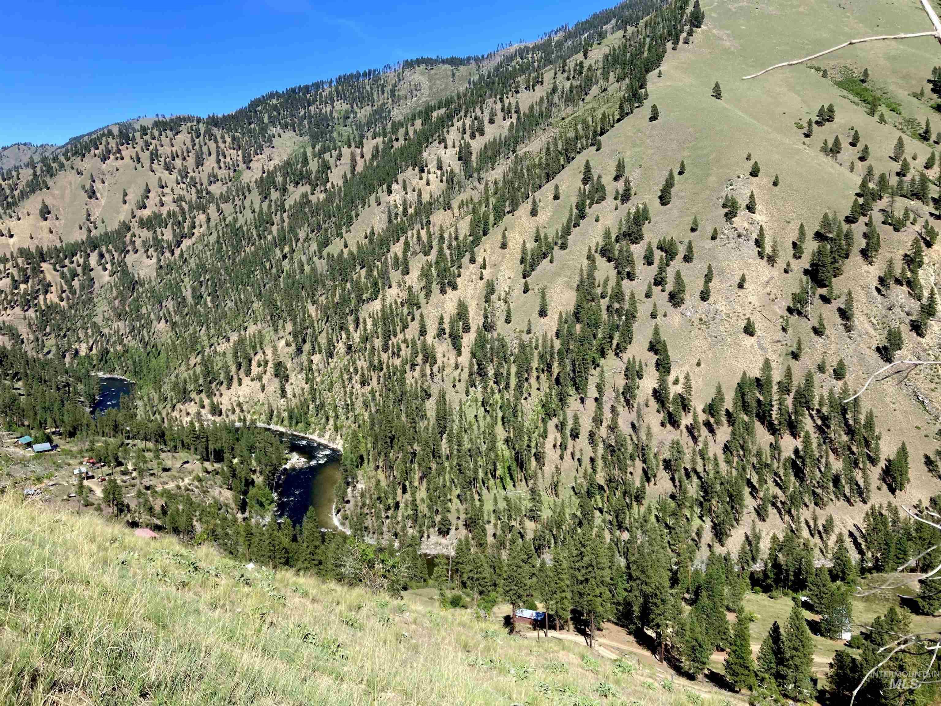 View of mountain background featuring a nearby body of water