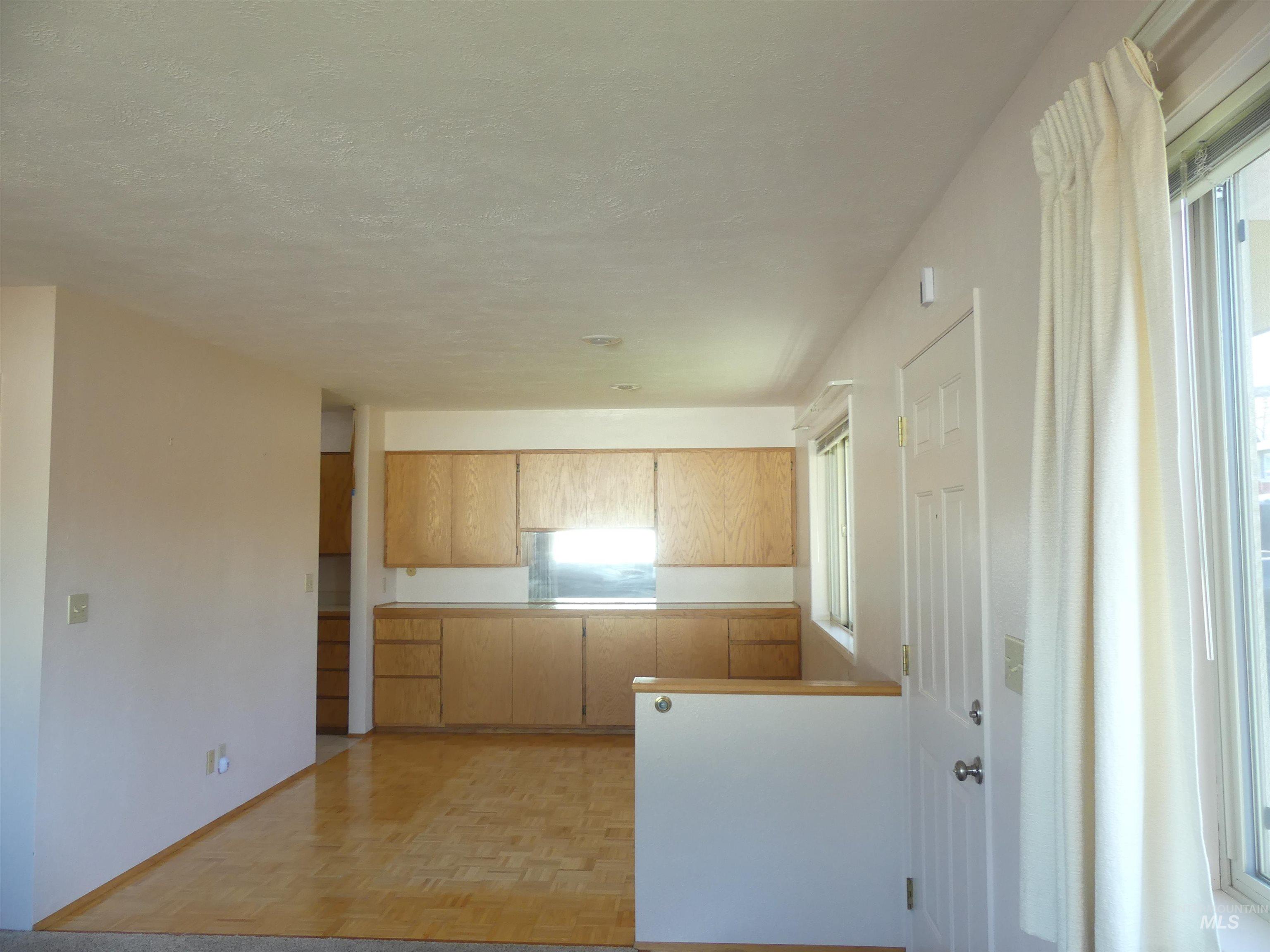 Kitchen with light brown cabinetry