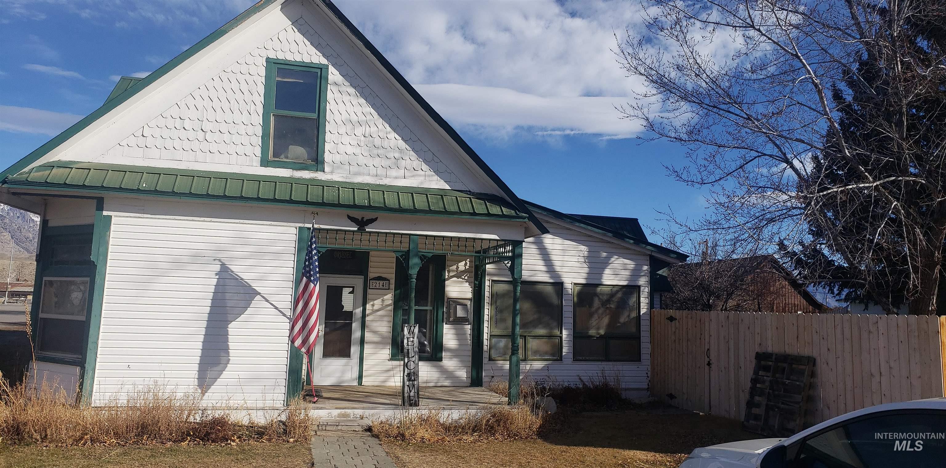 View of front of property with a metal roof