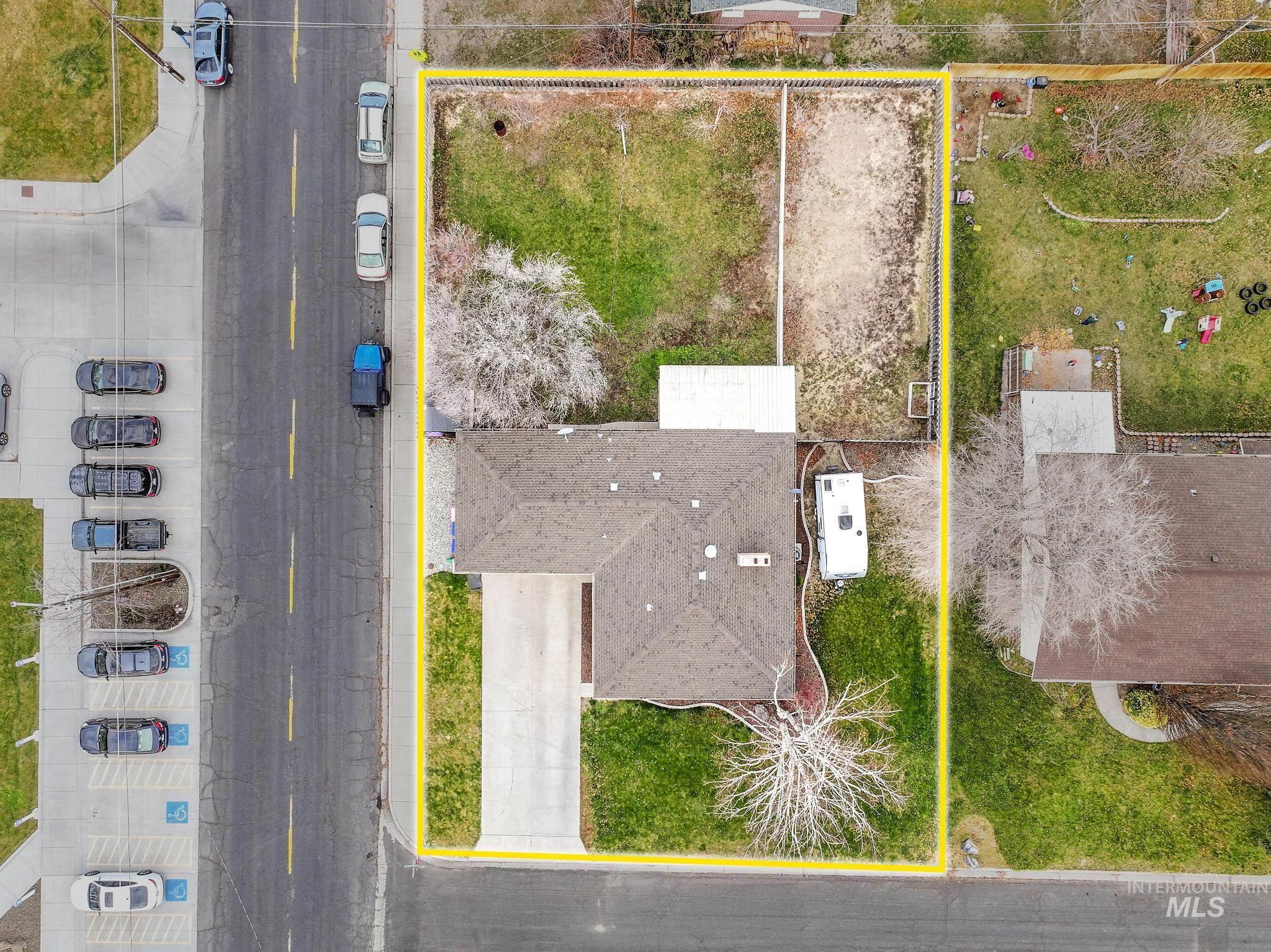 Aerial view of property's location featuring property parcel outlined