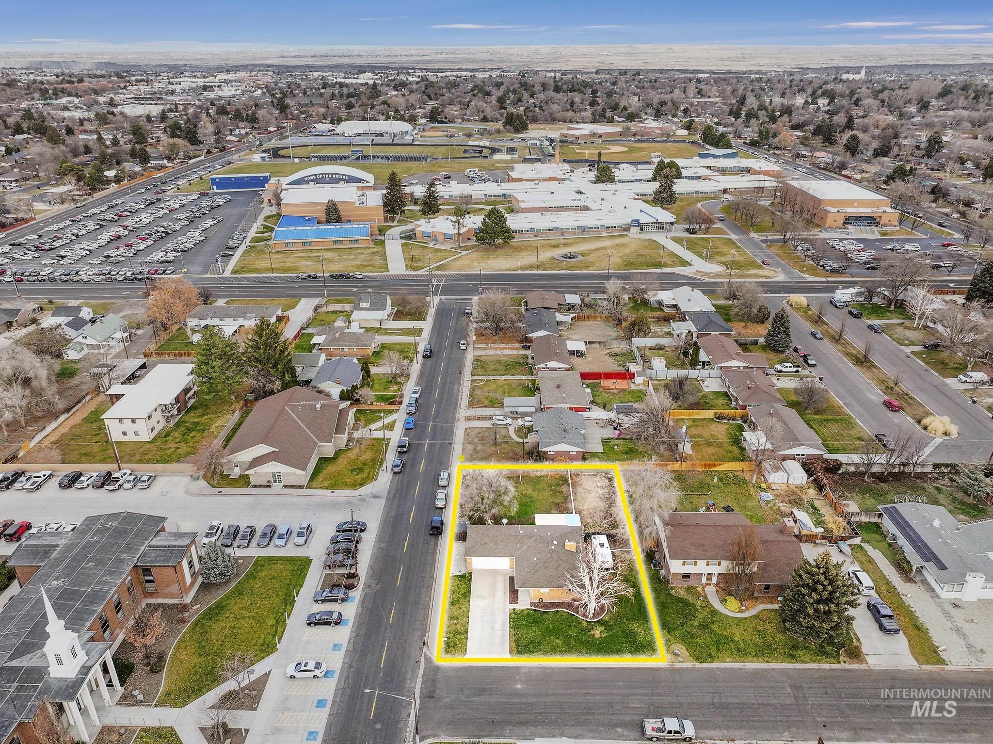 Aerial overview of property's location featuring property boundaries highlighted