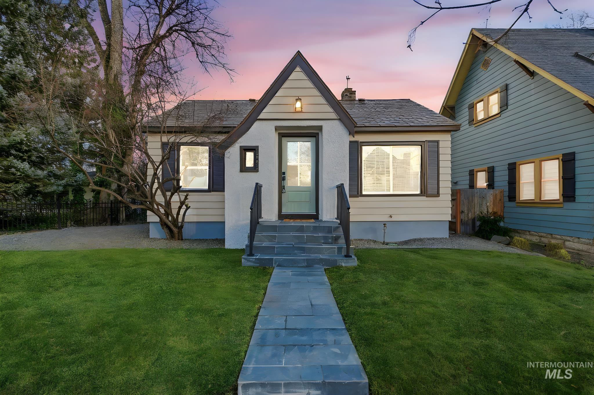 View of front of house with a chimney