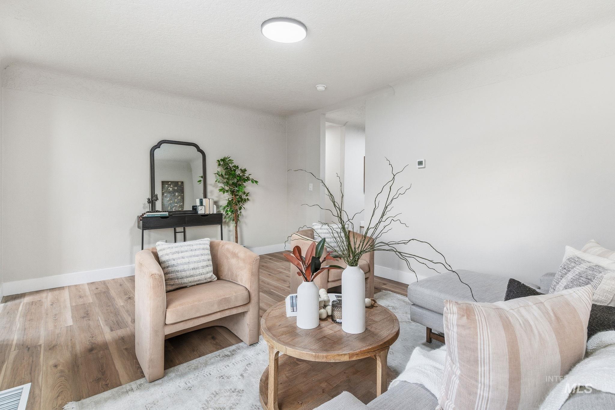 Living area with wood finished floors