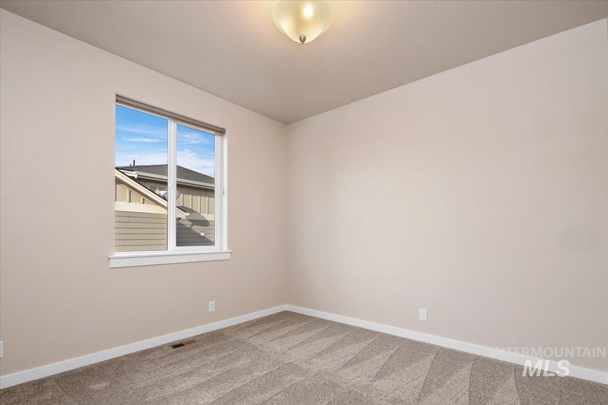 2nd bedroom to the front of the home.