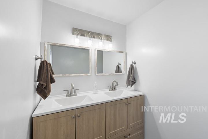 Bathroom featuring double vanity