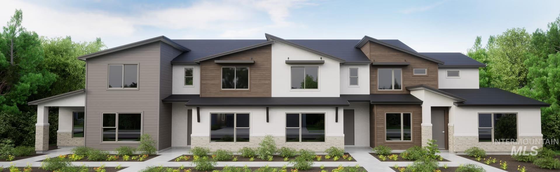 Contemporary home featuring stucco siding