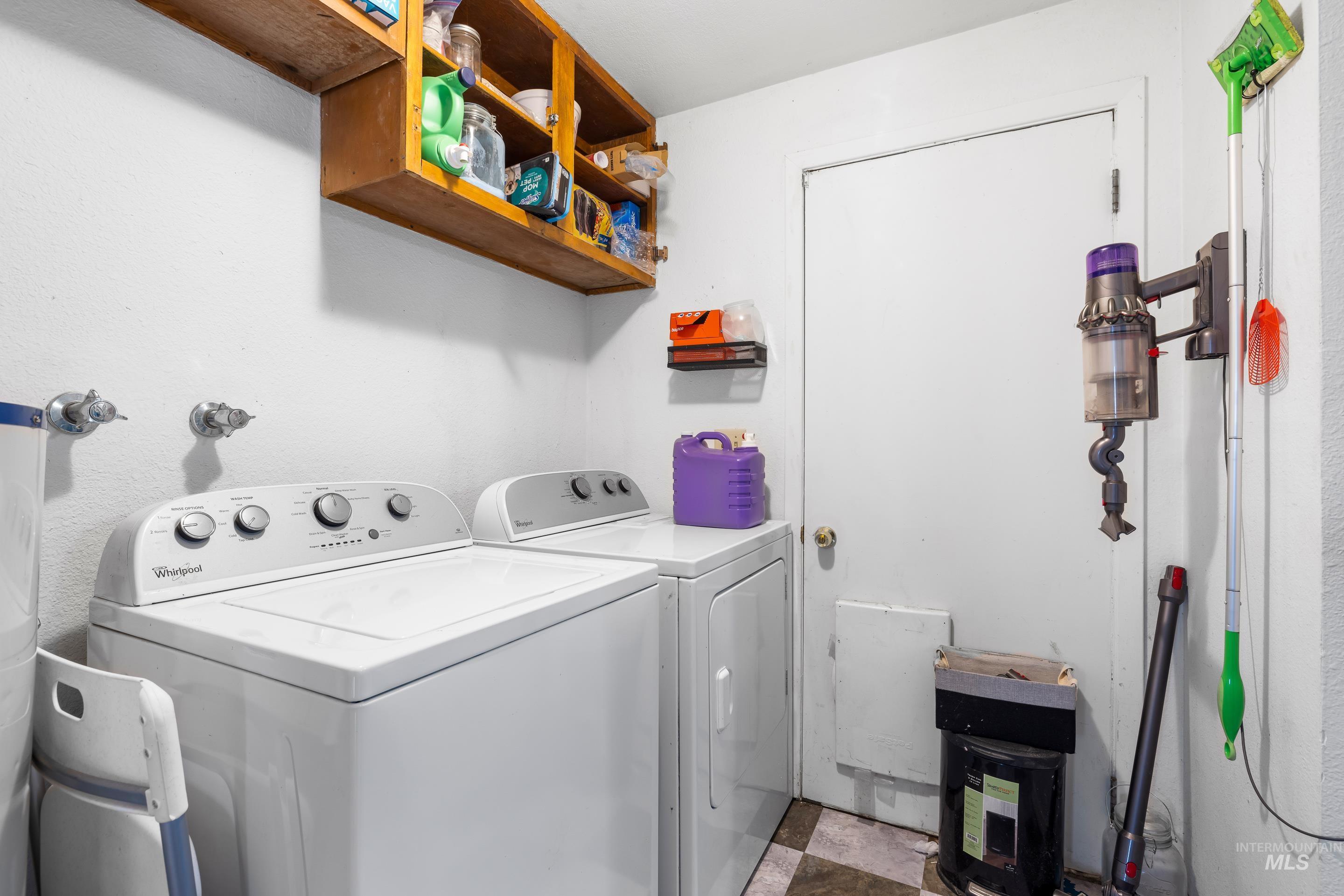 Laundry area featuring washer and clothes dryer