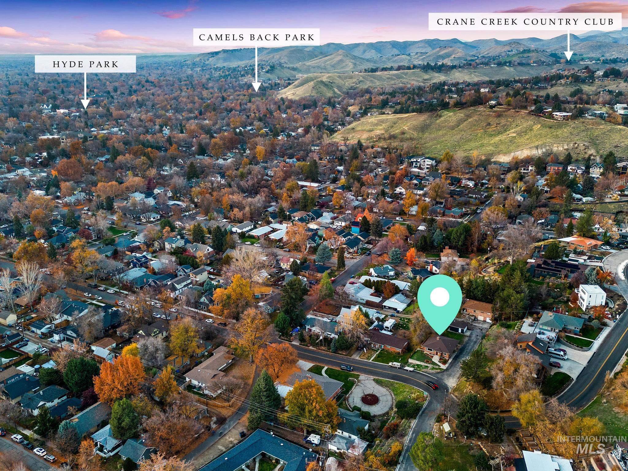 Aerial overview of property's location with nearby suburban area