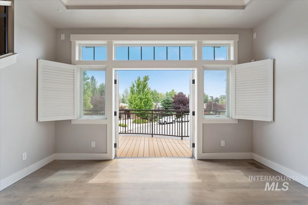 Doorway with wood finished floors