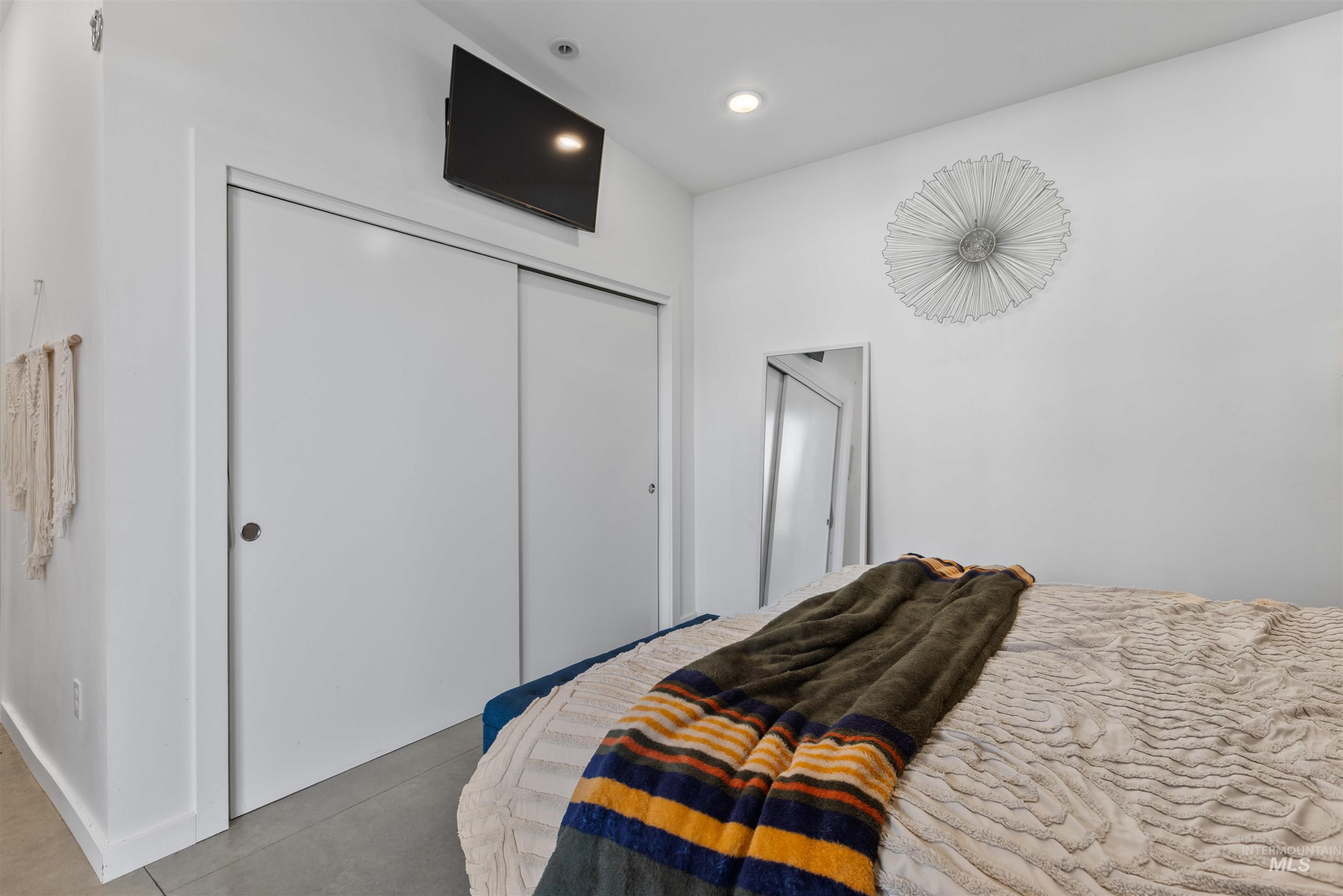 Bedroom featuring a closet and recessed lighting