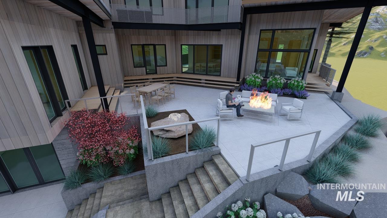 View of patio featuring a fire pit