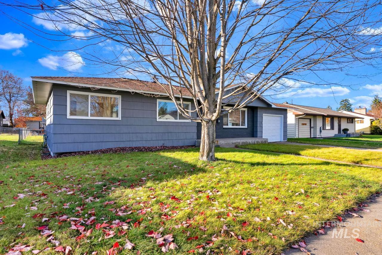 View of front of property with a garage