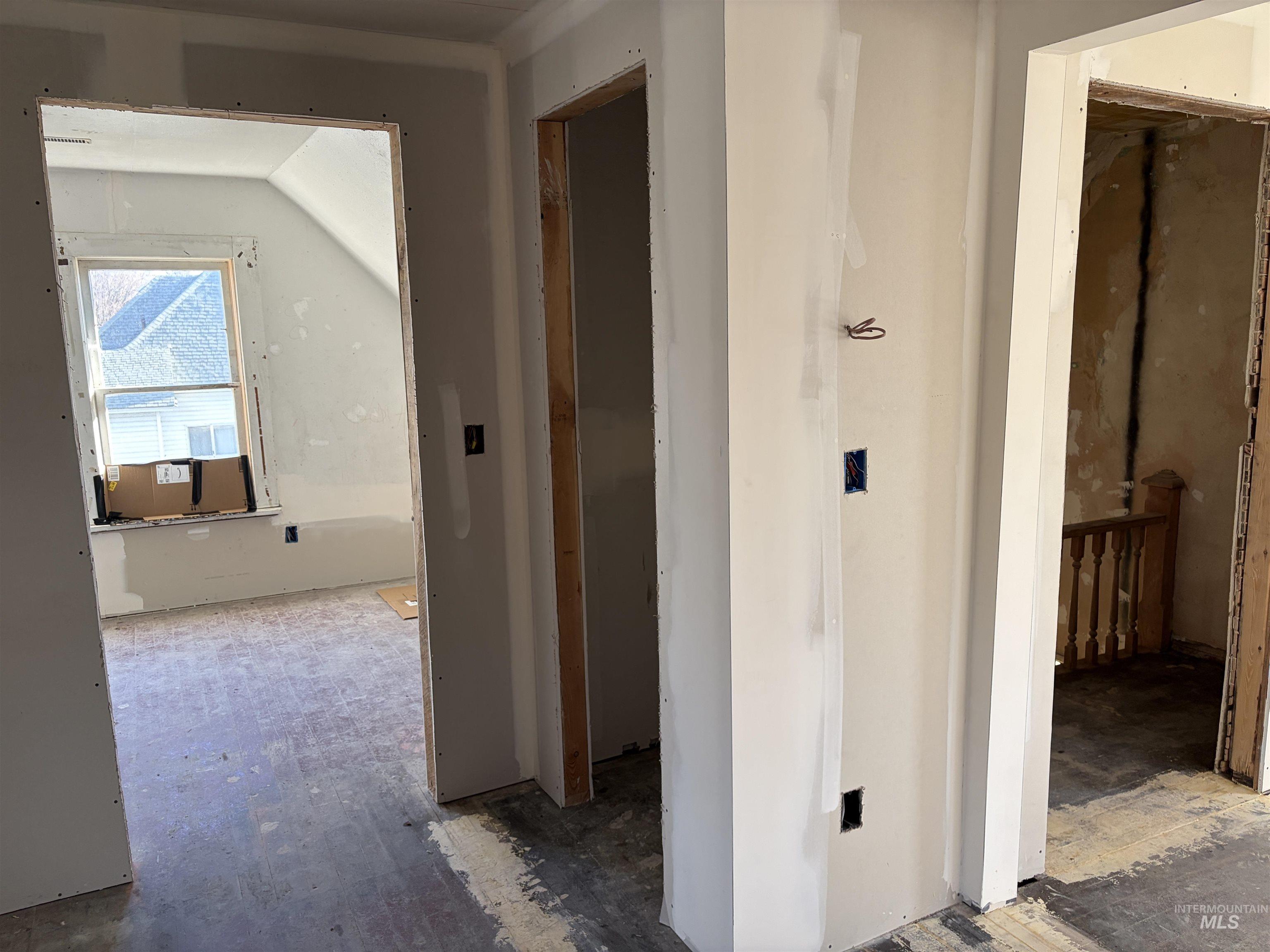 Hall with lofted ceiling and cooling unit