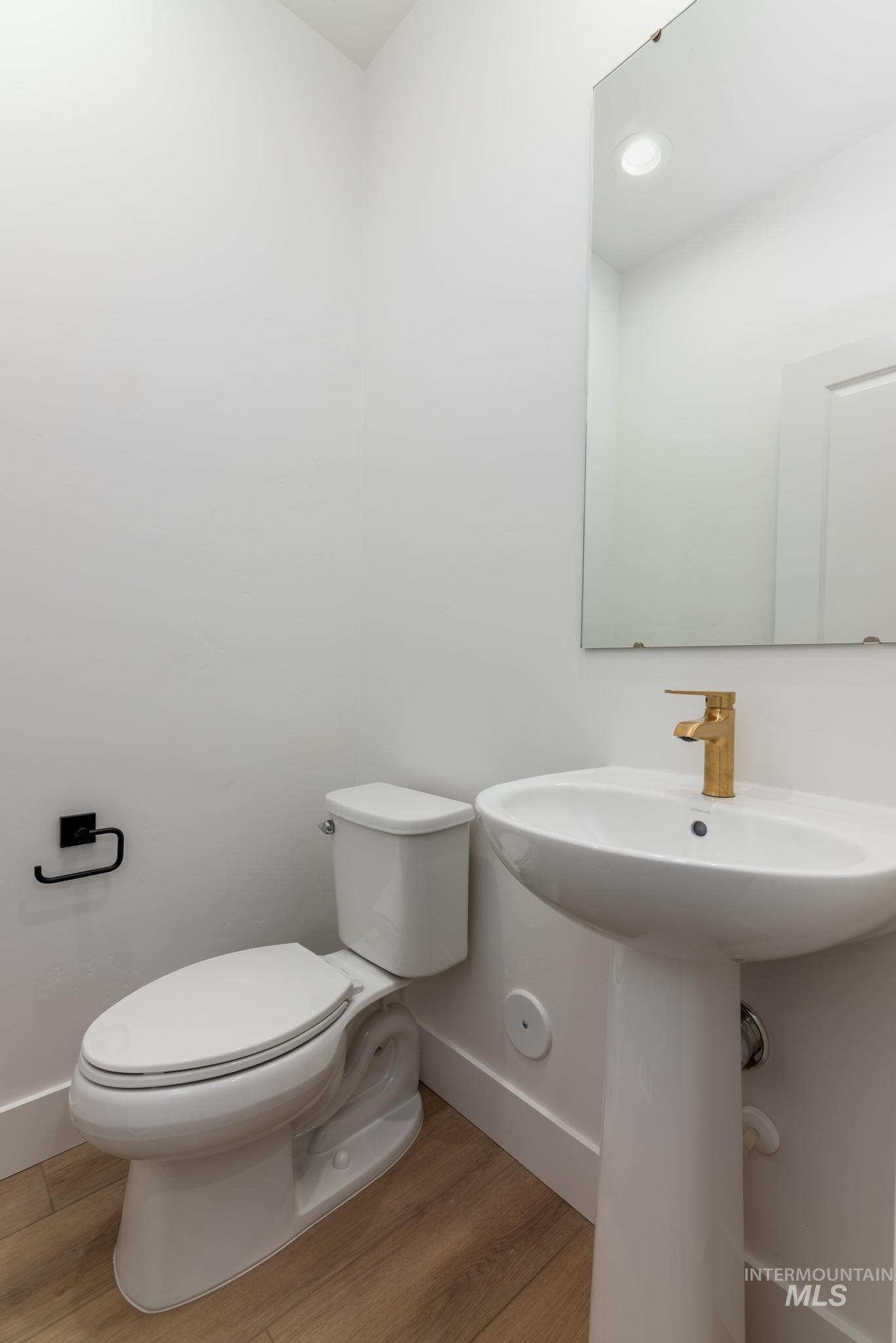 Bathroom featuring light wood finished floors