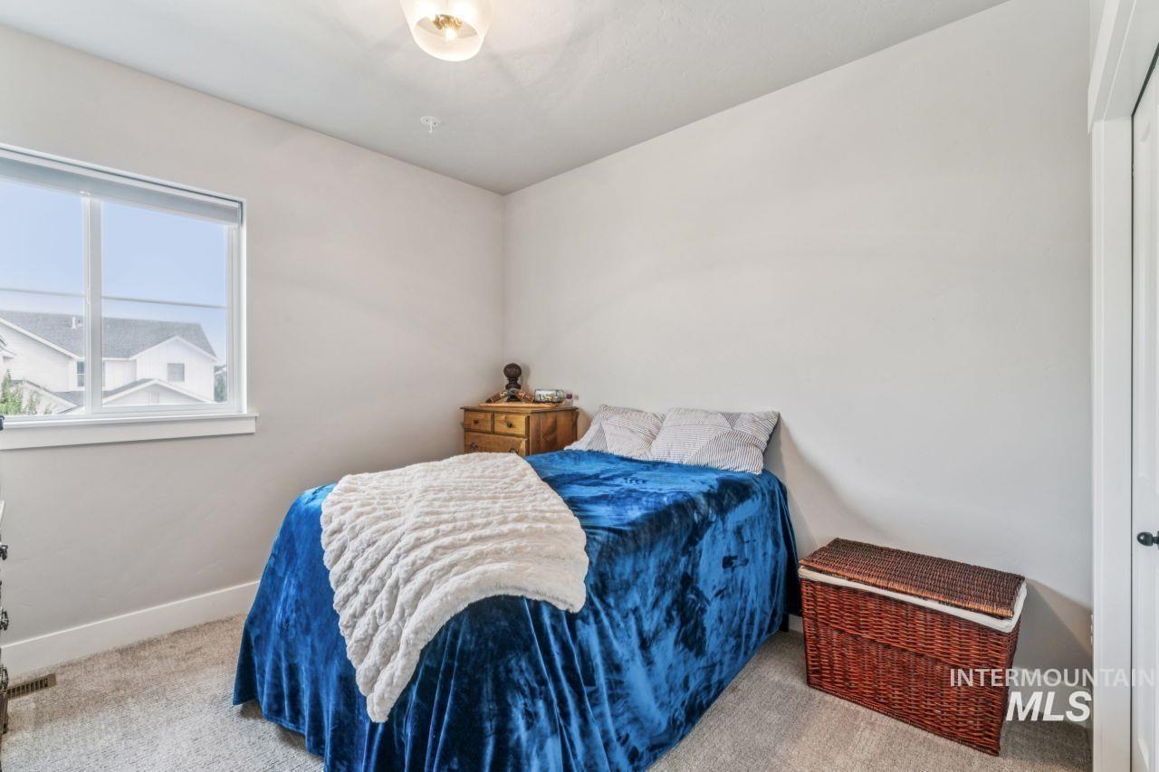 Bedroom featuring carpet
