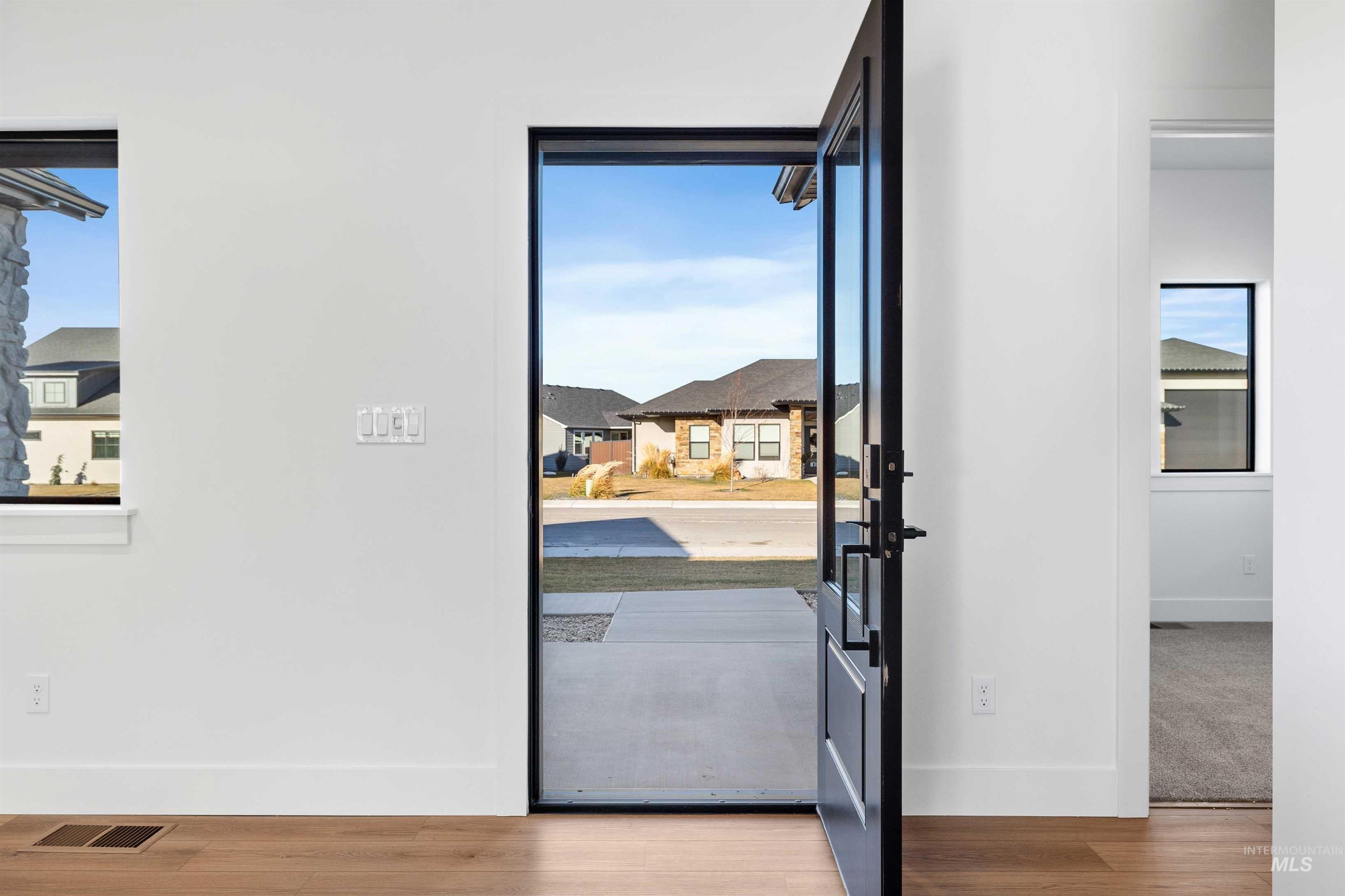 Entryway featuring wood finished floors