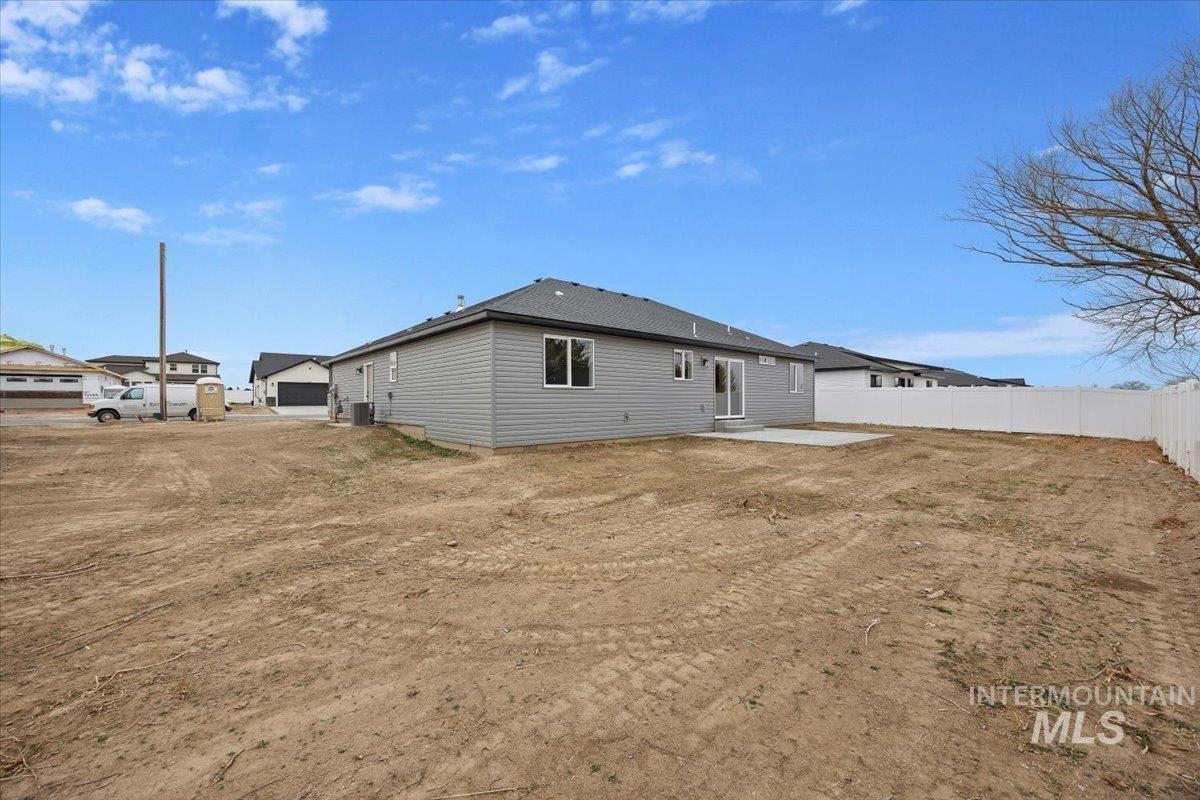 Back of property with a patio area
