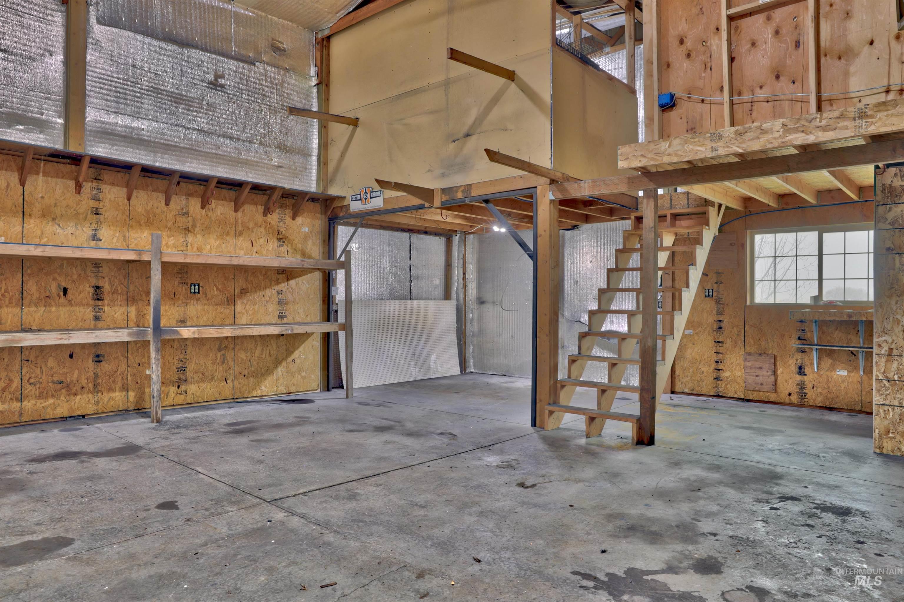 Recently added office upstairs with built in desk & storage room.