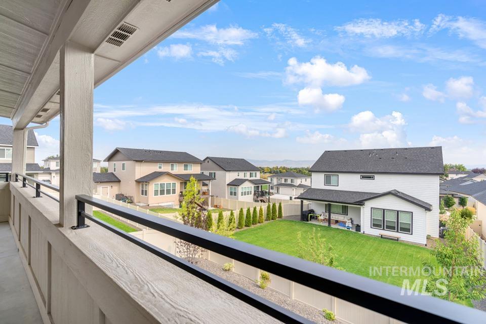 Balcony featuring a residential view