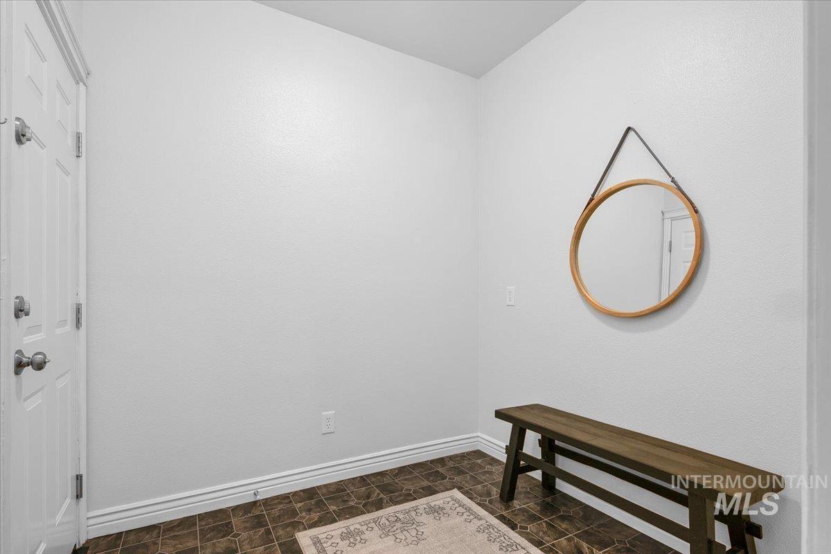 Interior space featuring baseboards